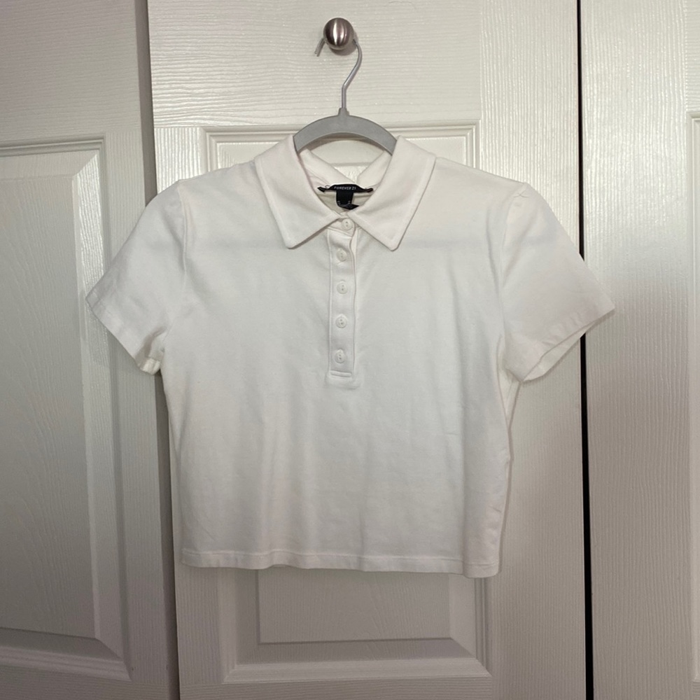 this is a collared white button up crop top from forever 21